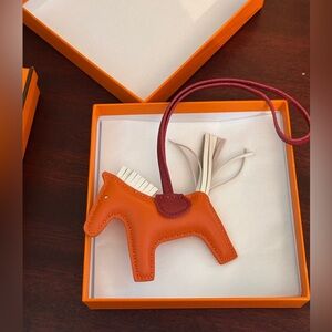 Authentic Milo Hermès GriGri Rodeo TPM bag charm. From the 2021 Collection.